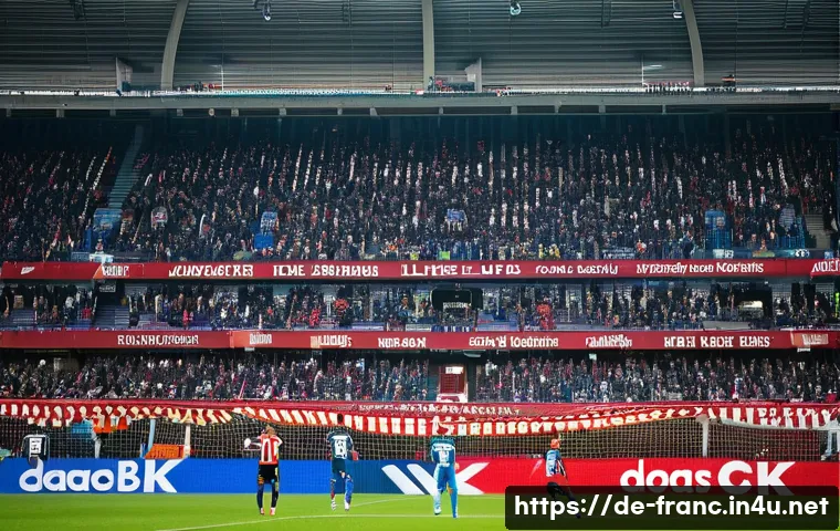프랑스 리그앙 명문 축구 클럽 - A vibrant stadium scene during a Ligue 1 match in France, showcasing passionate fans in colorful clu...